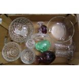 A collection of cut glass and crystal items to include: bowls, vases, paperweights etc