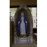 A large garden ornament our lady grotto: solar powered