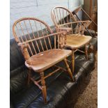 A pair of reproduction Windsor style elm arm chairs: