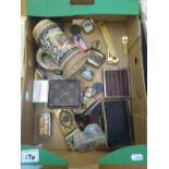 A mixed collection of items to include: small tin boxes, 1930's silver plate match box holder,