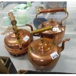 Three copper kettles: