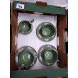 A Wedgwood sage green set of three cups & saucers: together with similar milk jug