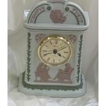 Wedgwood tri colour Tempus Fugit mantle clock: green, lilac and white with a modern clock movement (