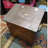 A hand beaten copper coal scuttle/box: with original liner.