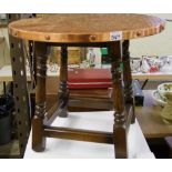 Circular copper topped coffee table: