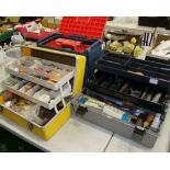 A collection of three hand tool boxes: and contents