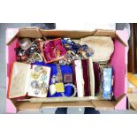 A large collection of costume jewellery to include: watches, brooches, necklaces, bangles beads etc