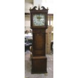 Oak and mahogany cased 8 day longcase clock circa 1830: with rolling Halifax Moon dial and fruit