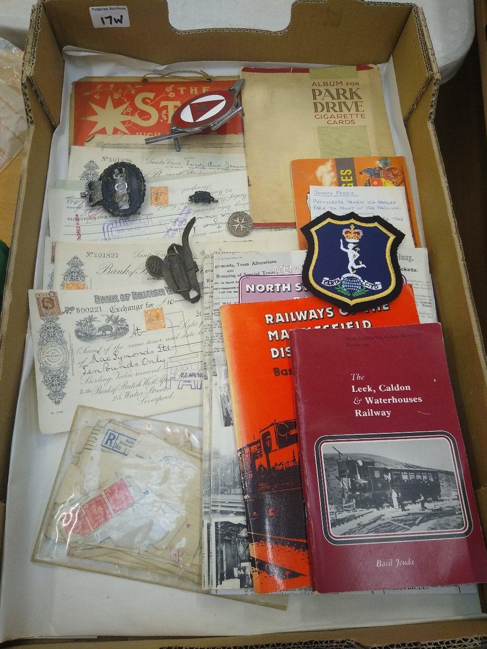 A mixed collection of items to include: 1930's bank bonds, local railway books, advanced motorise