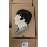 A quantity of Moorland Pottery face masks: depicting John Lennon, boxed (25).