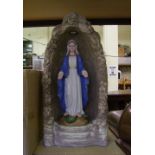 A large garden ornament our lady grotto: solar powered