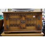 Oak linen fold tv cabinet: width 81cm