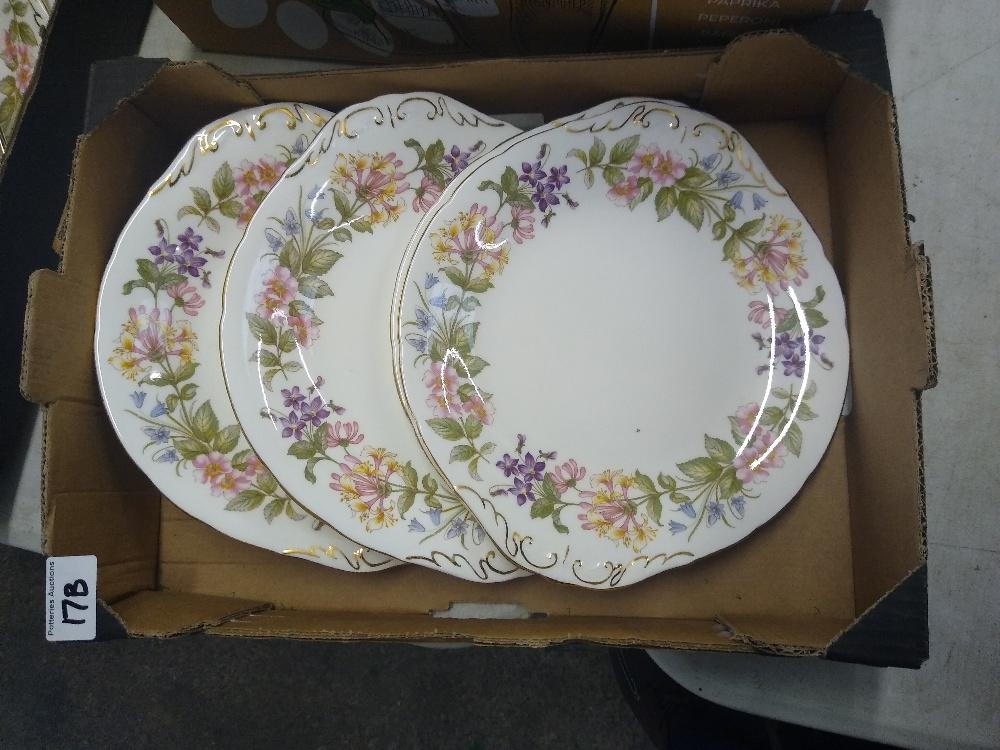 A collection of four paragon country lane floral sandwich plates: