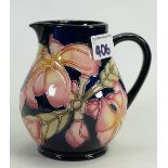 Moorcroft frangipani trail jug: by Phillip Gibson dated 13/12/2000. Height 15cm, boxed