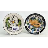 Two Moorcroft coasters: in the Phoebe pattern and a cat coaster designed by Rachel Bishop 2013. Both