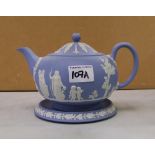 A Wedgwood blue jasperware teapot and stand: