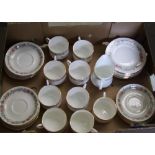 A collection of paragon Belinda tea ware: to include 12 side plates, 17 saucers, 9 cups and a milk
