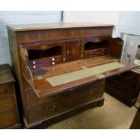 A mahogany secretaire chest.