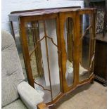 A walnut china display cabinet: