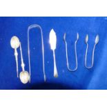 Group of silver tongs spoons etc: Tongs x 3, coronations spoons x 2 & a butter knife,