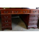 Reproduction Leather topped pedestal desk: With green leather (general scuffing to leather and