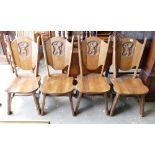Set of 4 Modern Dark Oak dinning chairs: with carved lion motif(4)
