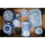 A collection of Wedgwood Japserware to include:lidded box, water jug, tea pot,