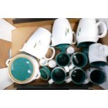 A collection of Denby stone ware green wheat: to include mugs, casserole dish,