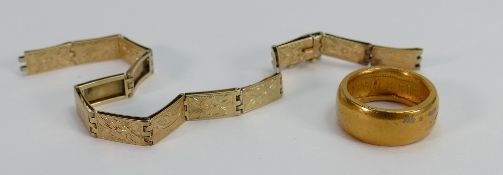 Yellow coloured metal bracelet testing as gold: Weight 7.