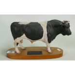 Beswick connoisseur model of a Friesian Bull on wood plinth A2580: