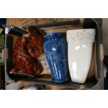 A mixed collection of items to include: Treacle glazed Staffordshire dog, similar egg keep,