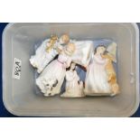 A collection of small Royal Doulton lady figures (5)