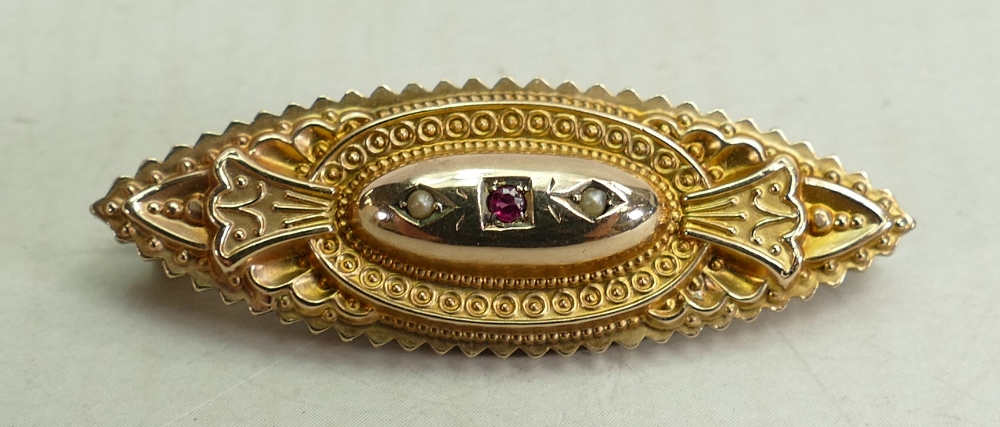 Victorian 9ct rose gold ornate brooch set with ruby and seed pearls, 3.8g.