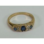 Ladies 9ct gold ring set with sapphire & diamonds: size Q, 3.3g.