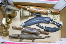 A mixed collection of items to include: Kukri Knives, similar items , Brass School bell,