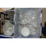 A large collection of Cut & Pressed Glass items to include, Vases, Bowls, Decanters,