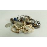 A collection of vintage ladies costume jewellery: including silver brooches & rings, chains,