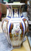 Large Italian octagonal vase : decorated with peacocks.