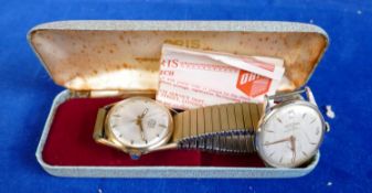 Two vintage gents watches Oris & Dogma: Oris super ticks, original case and document, dial slipped.