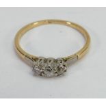 yellow metal three stone diamond ring:high carat gold, ring size N, 1.6g.
