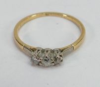 yellow metal three stone diamond ring:high carat gold, ring size N, 1.6g.