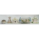 A mixed collection of items to include: Coalport Cottages,