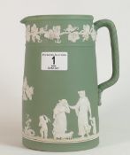 Wedgwood green jasper ware dipped handled jug: height 19cm