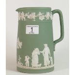 Wedgwood green jasper ware dipped handled jug: height 19cm