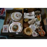 A mixed collection of items to include: floral decorative vases, wall plates,
