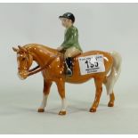 Beswick boy on Palomino pony: Beswick model 1500(tiny chip to hat)