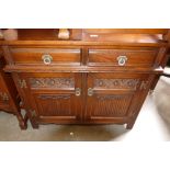 Oak Linen Fold 2 door/ 2 drawer chest of drawers: