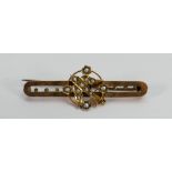 Victorian 9ct gold bar brooch set with seed pearls: with steel back pin, 2.4g.