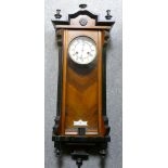 19th century Vienna Wall clock: In Walnut case, enamel dial, overall height 84cm x w30cm.