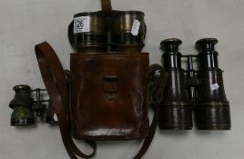 A Collection of Antique Brass & Leather Binoculars: one set cased